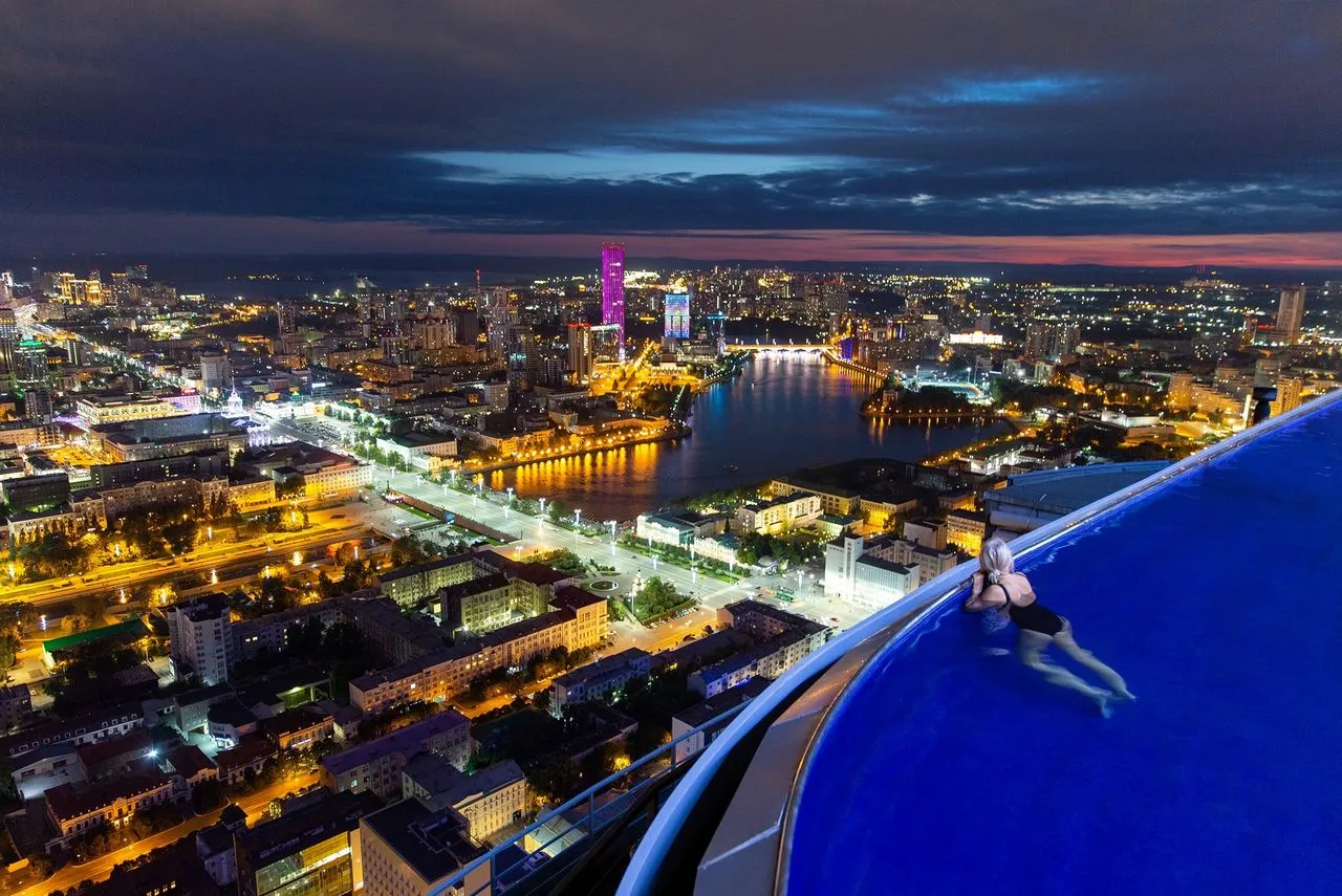 Swim in the rooftop pool of a high-rise